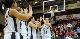 Image courtesy of GoBonnies.com: Senior guard Jessica Jenkins high fives her teammates before a game.