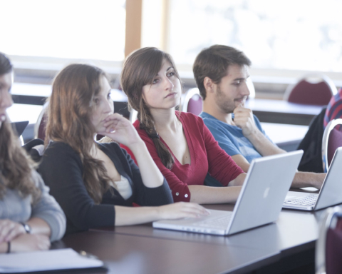 Students in a classroom on their laptops